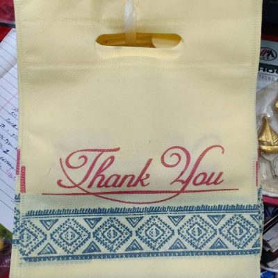 White bag with diamond pattern border bag | D Cut bags